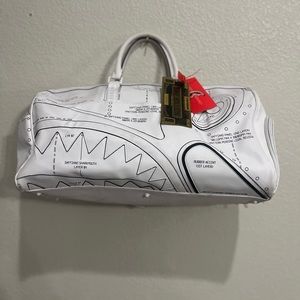 Spray ground duffle bag